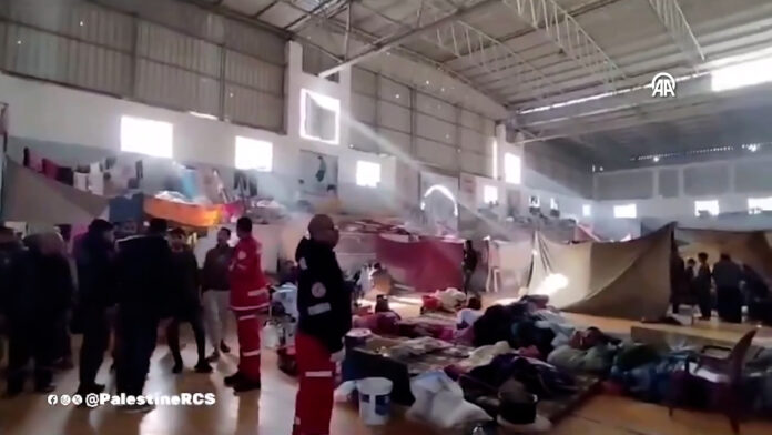 Patients, displaced families cower under Israeli siege in Gaza hospital