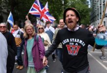 Tommy Robinson’s hate rally mocked as music, march and messaging fall flat