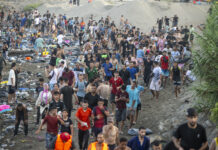 Spain mobilises military as over 49,000 migrants crossing from Morocco overwhelm Ceuta